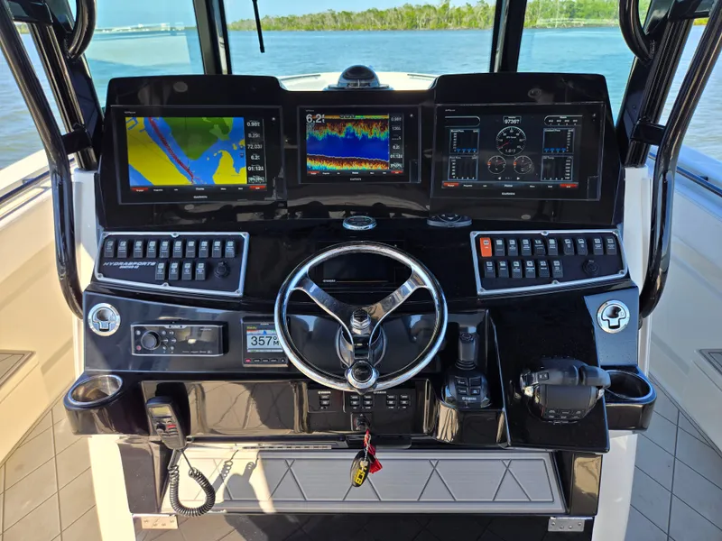 Slide: The Image of HCB 42 Siesta 2018 helm with navigation systems and controls. - 8