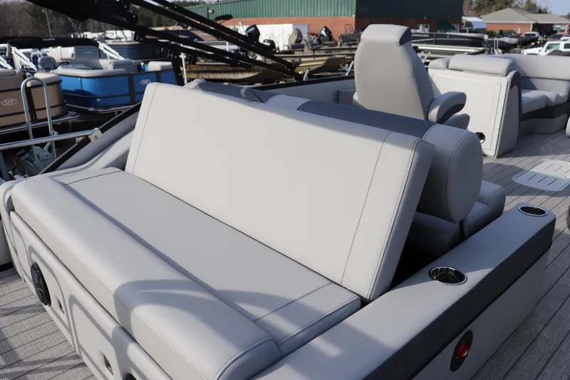 Slide: The Image of 2026 Bentley Pontoons Elite 223 SwingBack DC with luxurious seating and modern design. - 10