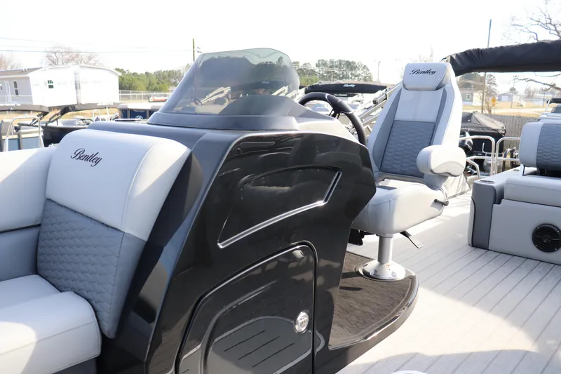 Slide: The Image of 2026 Bentley Pontoons Elite 223 SwingBack DC interior with luxurious seating and modern design. - 4