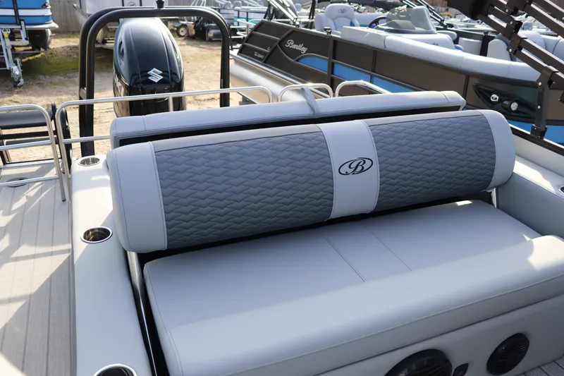 Slide: The Image of 2026 Bentley Pontoons Elite 223 SwingBack DC with luxurious seating and sleek design. - 8