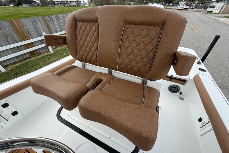 Slide: The Image of 2026 Sea Hunt BX 25 FS boat with luxurious brown seating and diamond stitching. - 10