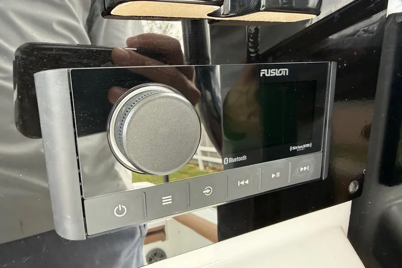 Slide: The Image of Fusion audio system on 2026 Sea Hunt BX 25 FS boat dashboard. - 19