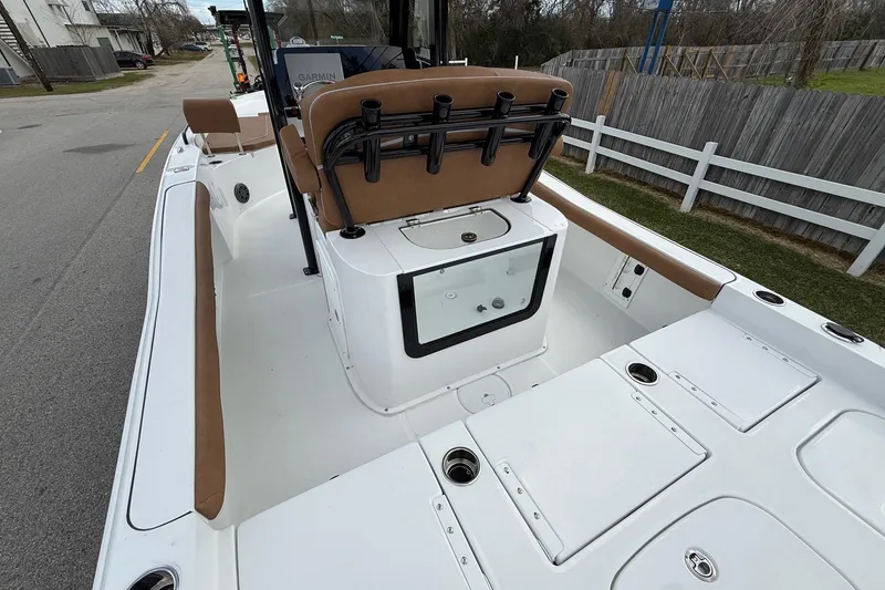 Slide: The Image of 2026 Sea Hunt BX 25 FS boat interior with seating and storage compartments. - 9