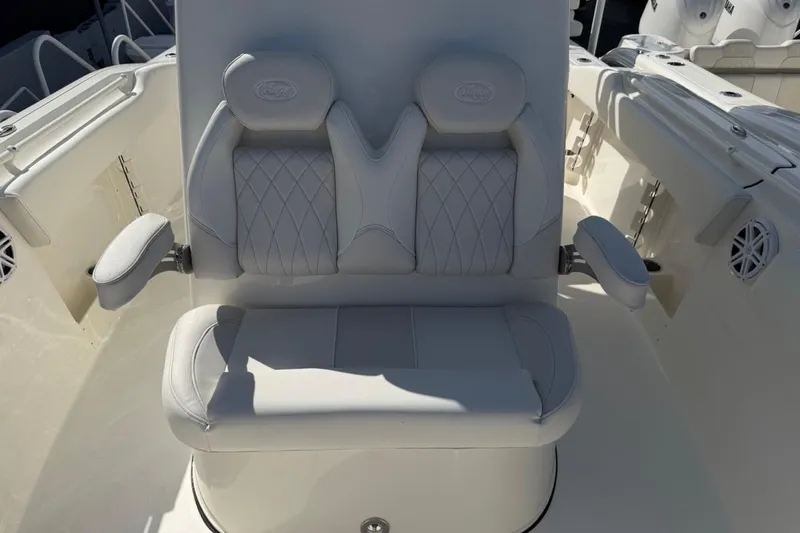 Slide: The Image of Luxurious seating on 2026 Key West 263 FS boat, featuring elegant white upholstery. - 13