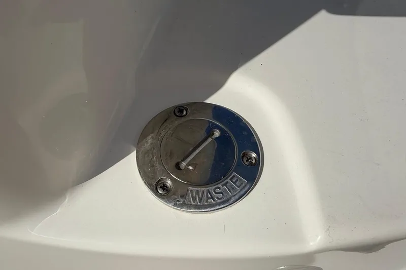 Slide: The Image of Waste compartment cover on 2026 Key West 263 FS boat. - 41