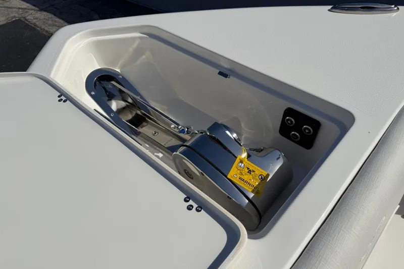 Slide: The Image of 2026 Key West 263 FS boat anchor compartment with stainless steel hardware. - 44