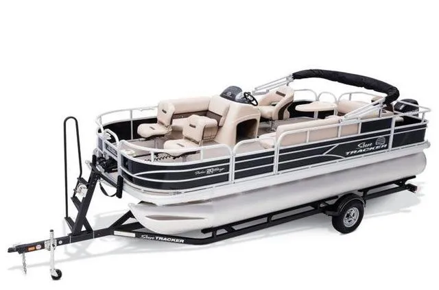 The Image of 2017 Sun Tracker Fishin' Barge 20 DLX pontoon boat on trailer. - 1
