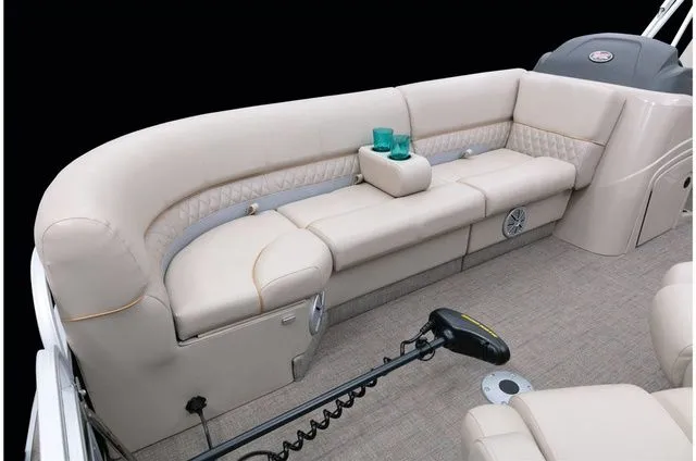 Slide: The Image of Interior of a 2022 Ranger 223FC boat with beige seating. - 25