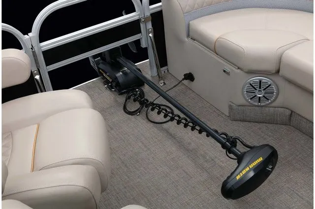 Slide: The Image of Interior of a 2022 Ranger 223FC boat with beige upholstery and speaker. - 30