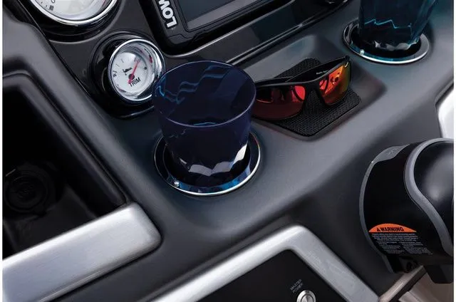 Slide: The Image of Dashboard of 2022 Ranger 223FC with cup holder and sunglasses. - 47