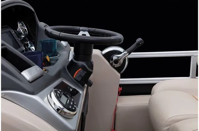 Slide: The Image of Steering console of a 2022 Ranger 223FC boat. - 48