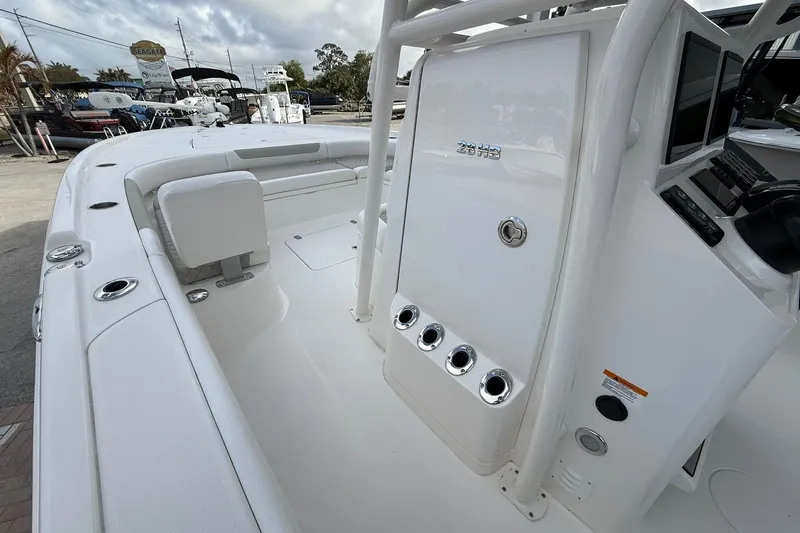 Slide: The Image of 2022 Caymas 28 HB Twin boat interior with seating and control panel. - 13