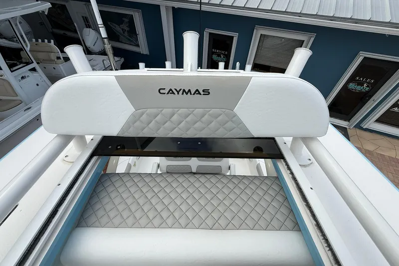 Slide: The Image of 2022 Caymas 28 HB Twin boat with quilted seating and rod holders. - 21