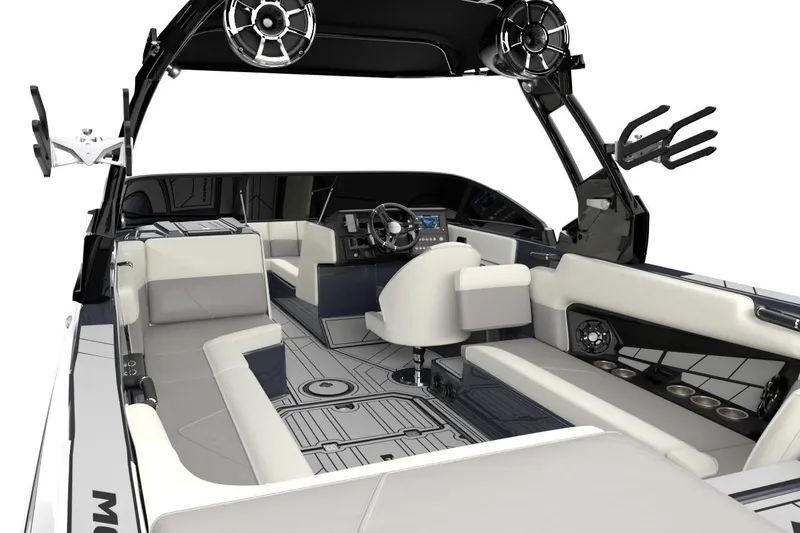 Slide: The Image of 2026 Moomba Tykon boat in showroom, rear view with Raptor engine branding. - 6