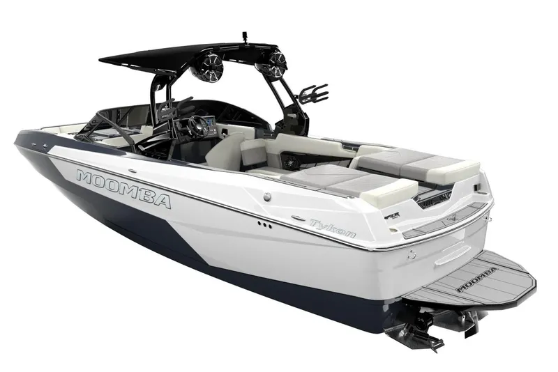 Slide: The Image of 2026 Moomba Tykon boat interior with tan seating and wood-style flooring. - 8