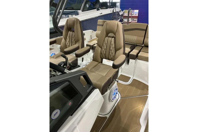 Slide: The Image of 2026 Monterey Elite 25 SD boat interior with luxurious seating and modern design. - 15