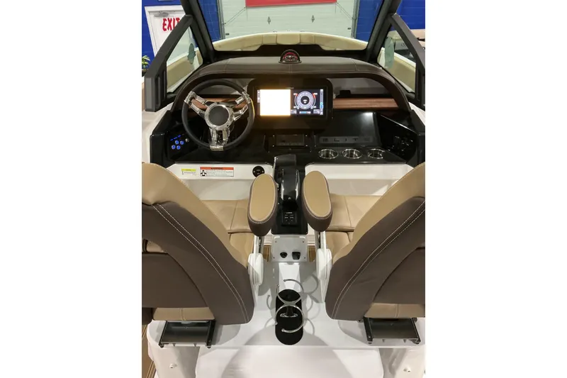 Slide: The Image of 2026 Monterey Elite 25 SD boat interior with modern dashboard and steering wheel. - 8