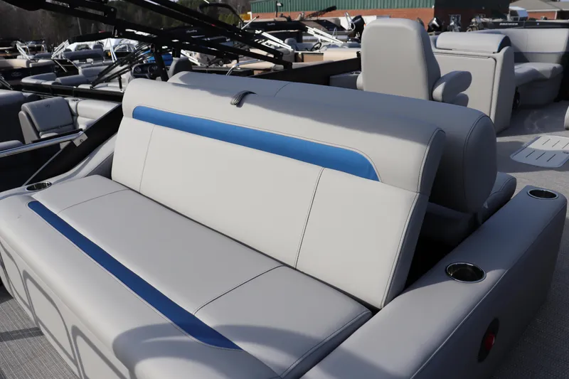 Slide: The Image of 2026 Bentley Pontoons Legacy 223 Swingback interior with gray and blue seating. - 8