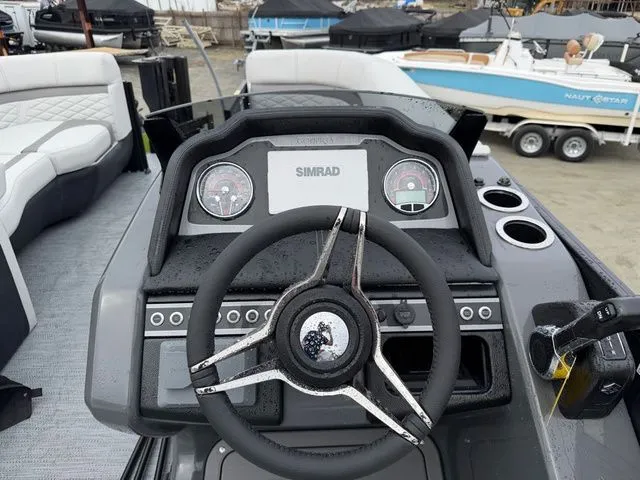 Slide: The Image of Godfrey Monaco 235 SFL 2026 helm with Simrad display. - 18