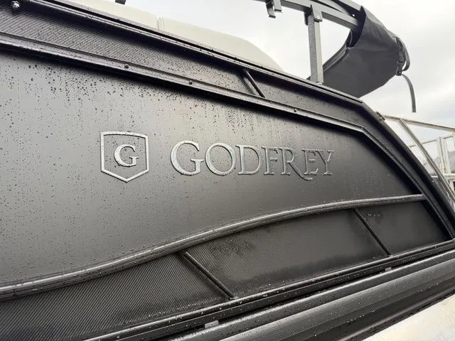 Slide: The Image of 2026 Godfrey Monaco 235 SFL boat with wet deck. - 4