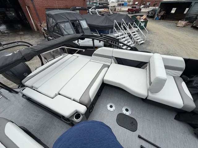 Slide: The Image of Interior of 2026 Godfrey Monaco 235 SFL with white seating. - 6