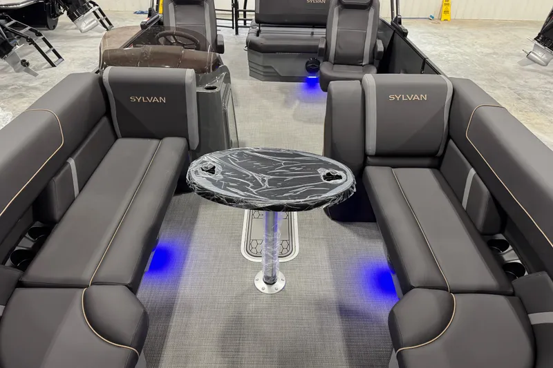 Slide: The Image of Luxurious interior of 2026 Sylvan X5 boat with sleek seating and modern table design. - 7