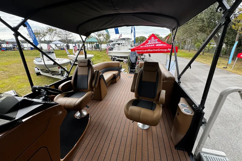 Slide: The Image of 2026 Bentley Pontoons Elite 253 Admiral interior with luxurious seating and modern design. - 10