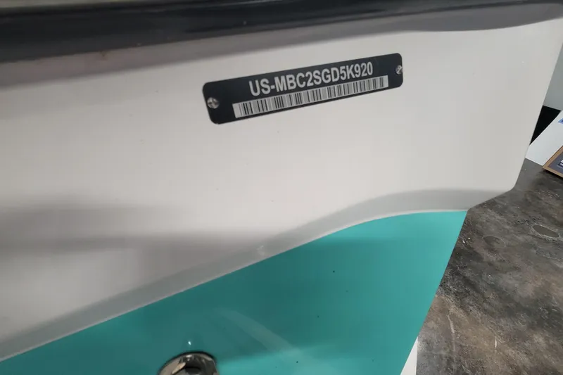 Slide: The Image of 2020 MasterCraft XT23 boat with visible hull identification number. - 10