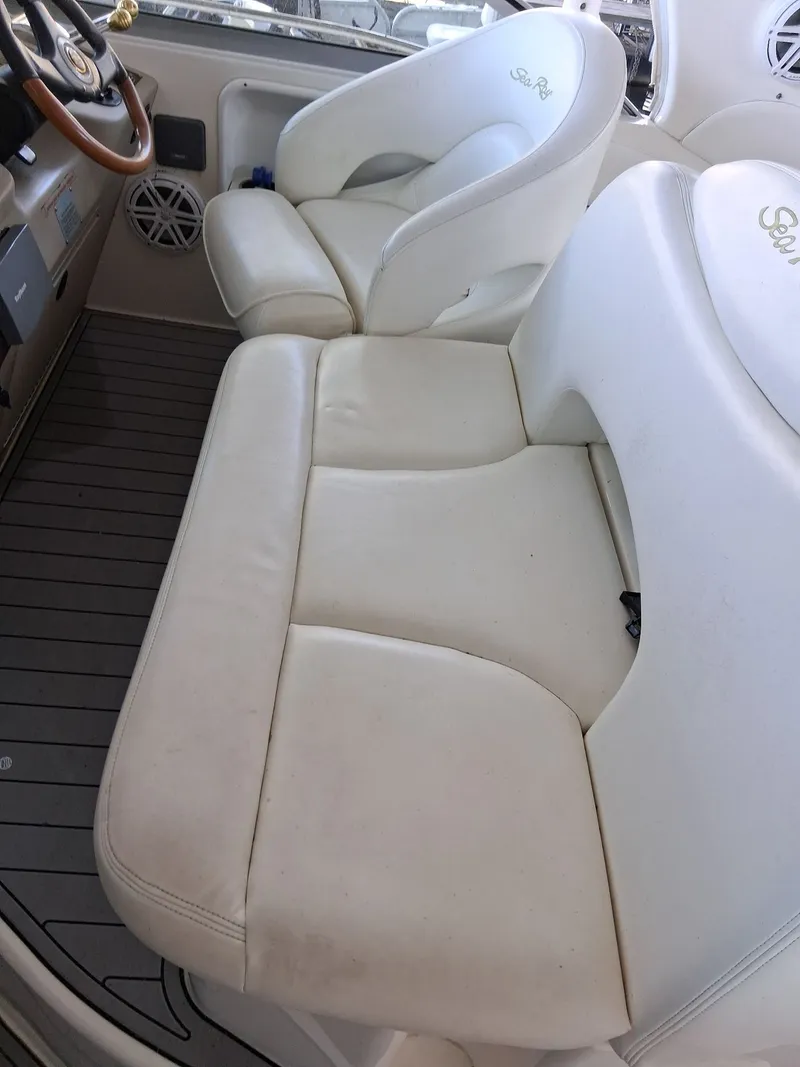 Slide: The Image of Interior of 2001 Sea Ray 340 Sundancer with white leather seats. - 10