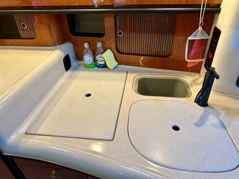 Slide: The Image of Galley area on a 2001 Sea Ray 340 Sundancer yacht. - 13