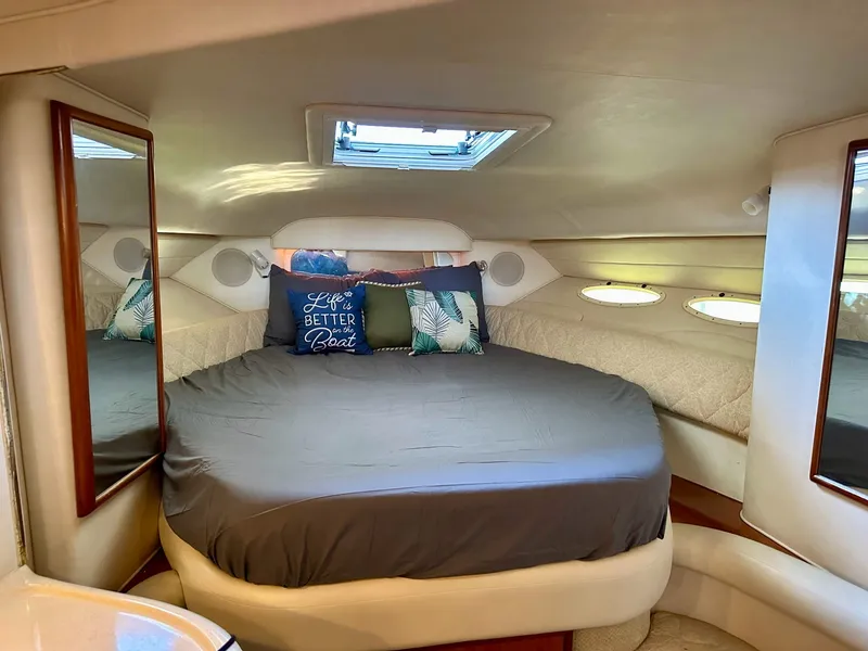 Slide: The Image of Interior of 2001 Sea Ray 340 Sundancer with cozy bed. - 15