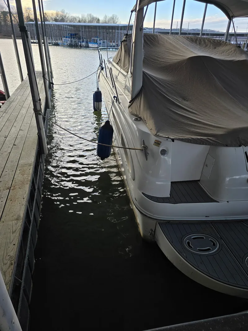 Slide: The Image of 2001 Sea Ray 340 Sundancer docked at marina. - 19