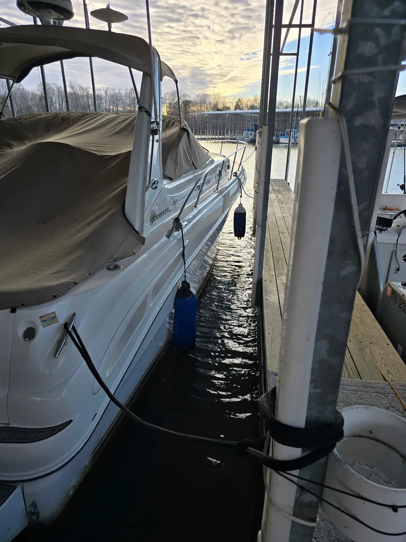 Slide: The Image of 2001 Sea Ray 340 Sundancer docked at sunset. - 20