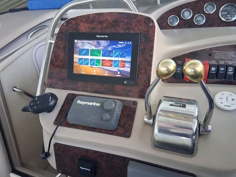 Slide: The Image of Sea Ray 340 Sundancer 2001 helm with Raymarine display. - 3