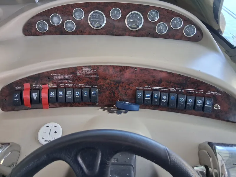 Slide: The Image of Dashboard of a 2001 Sea Ray 340 Sundancer boat. - 6