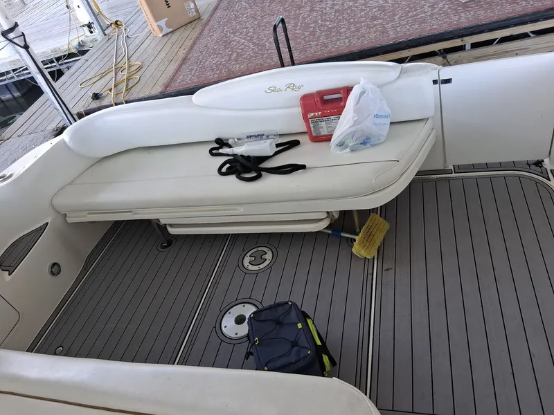 Slide: The Image of Interior of a 2001 Sea Ray 340 Sundancer with accessories. - 8