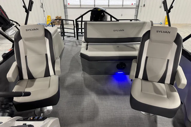 Slide: The Image of 2026 Sylvan X5 boat interior with modern seating and ambient lighting. - 10
