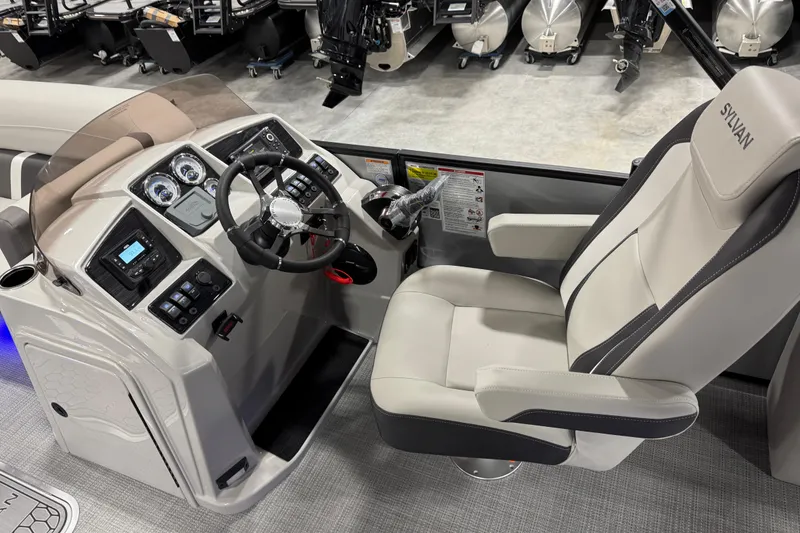 Slide: The Image of 2026 Sylvan X5 boat cockpit with modern steering and control panel. - 12