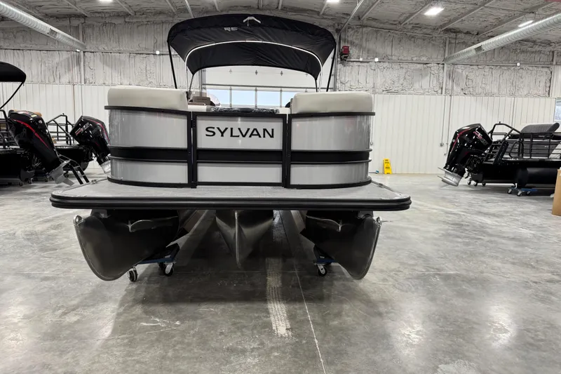 Slide: The Image of 2026 Sylvan X5 pontoon boat in a showroom, front view. - 6