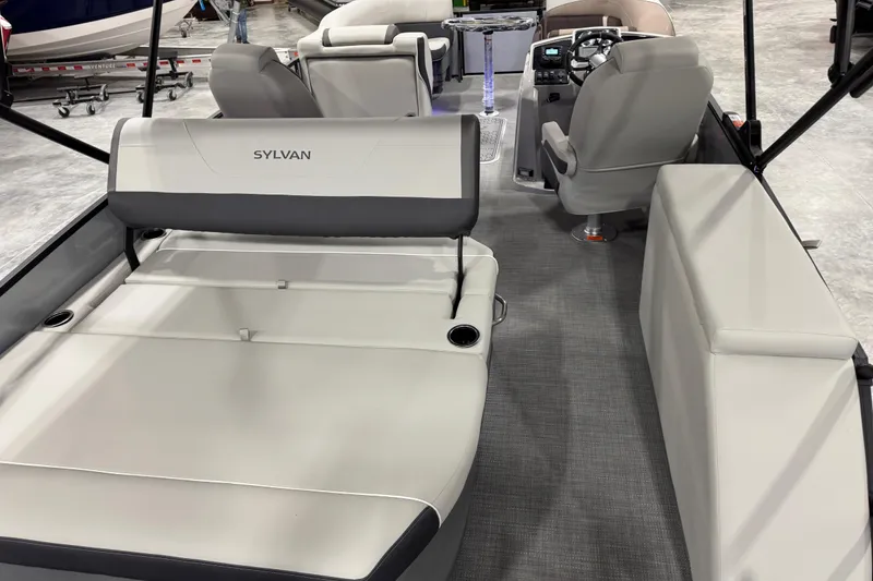 Slide: The Image of Interior view of 2026 Sylvan X5 boat with modern seating and controls. - 9