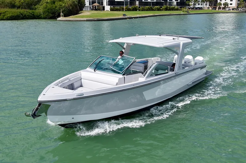 Slide: The Image of 2023 Aviara AV36 OB boat with luxurious seating and cup holders on deck. - 21