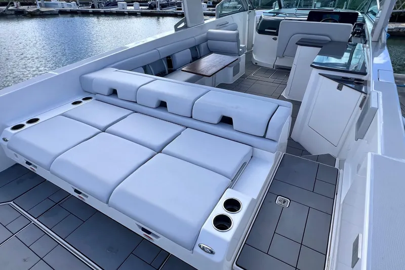 Slide: The Image of 2023 Aviara AV36 OB boat interior with open storage compartments and sleek design. - 31
