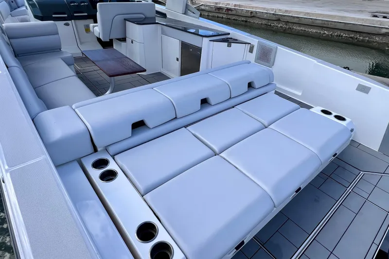 Slide: The Image of 2023 Aviara AV36 OB boat interior with sink and storage compartments. - 32