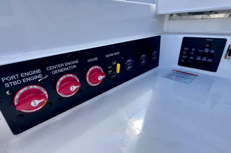 Slide: The Image of 2023 Aviara AV36 OB boat interior with luxurious seating and cup holders. - 34