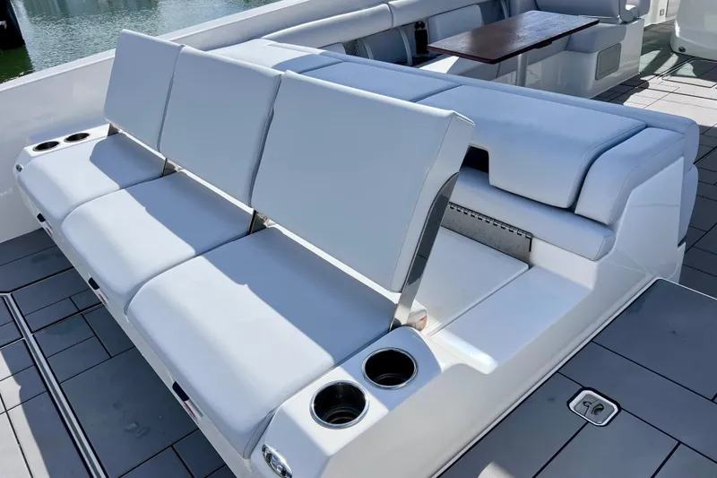 Slide: The Image of 2023 Aviara AV36 OB boat interior with sleek seating and modern flooring design. - 37