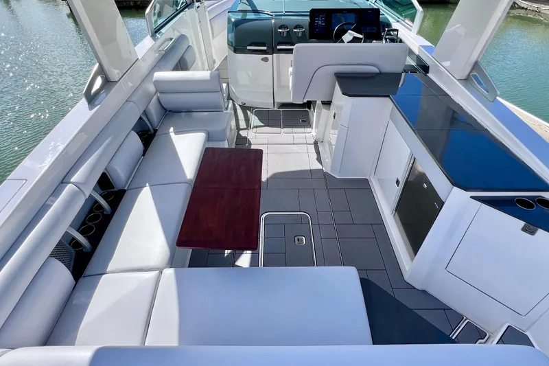 Slide: The Image of 2023 Aviara AV36 OB boat storage compartments with life jackets, modern design. - 39