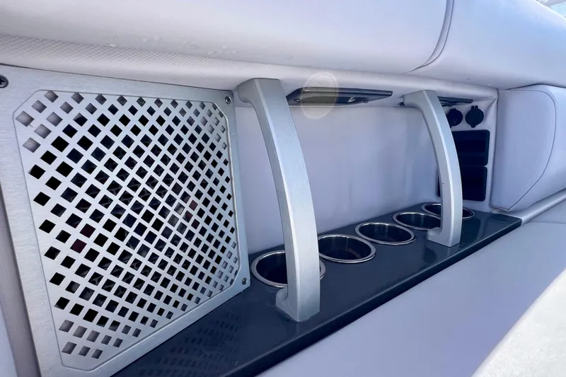 Slide: The Image of 2023 Aviara AV36 OB helm with advanced navigation displays and controls. - 42