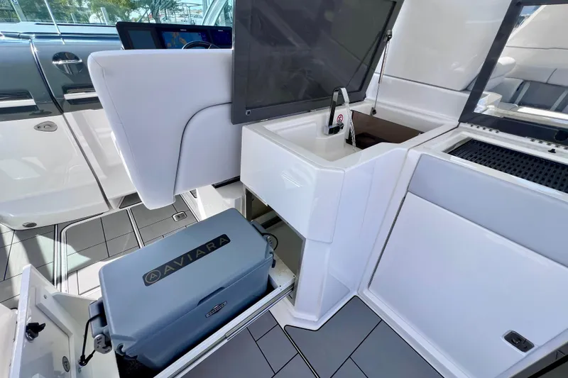 Slide: The Image of 2023 Aviara AV36 OB boat interior with sleek white seating and modern design. - 49