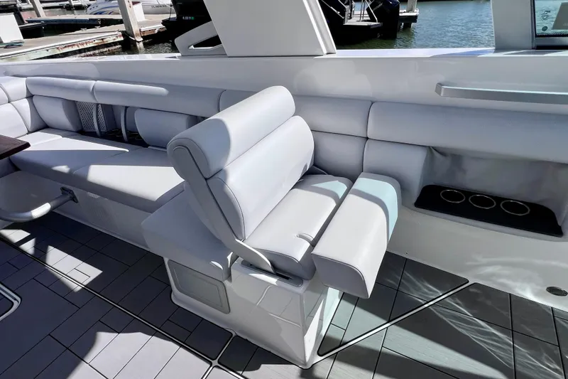 Slide: The Image of 2023 Aviara AV36 OB boat interior with sleek seating and modern dashboard design. - 50