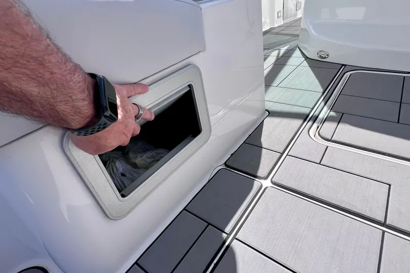 Slide: The Image of 2023 Aviara AV36 OB boat interior with sleek white seating and modern design. - 54